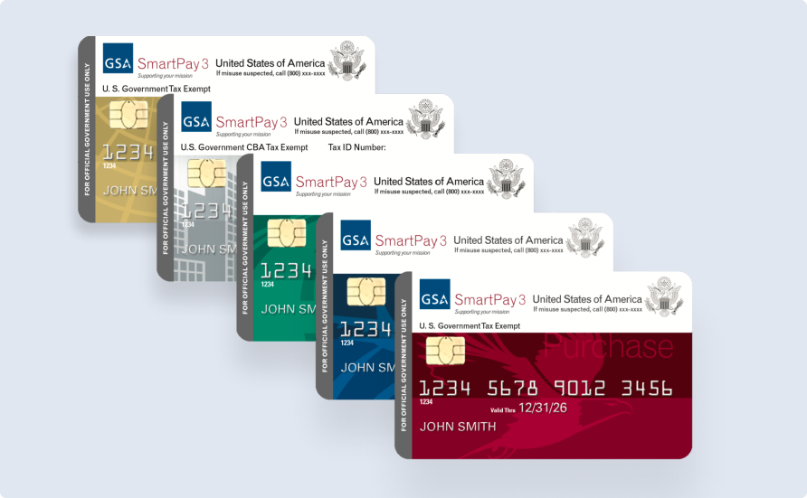 A series of yellow, silver, green, blue, and red GSA SmartPay charge cards stacked on each other, descending towards the bottom left.